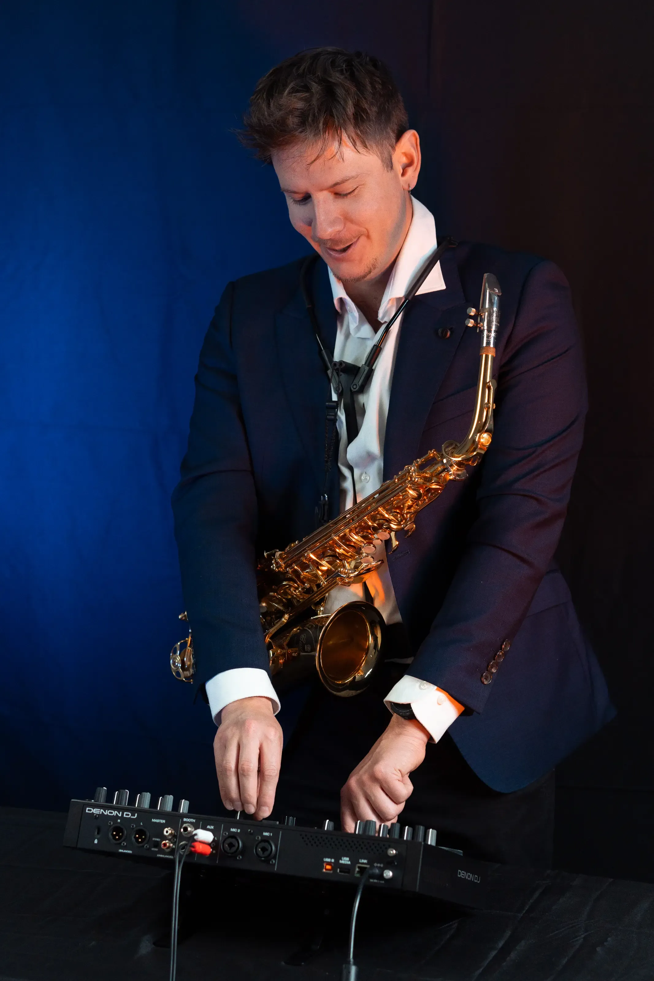 Gus Rodriguez playing saxophone live at an event in Adelaide